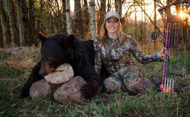 Woman with bear she shot